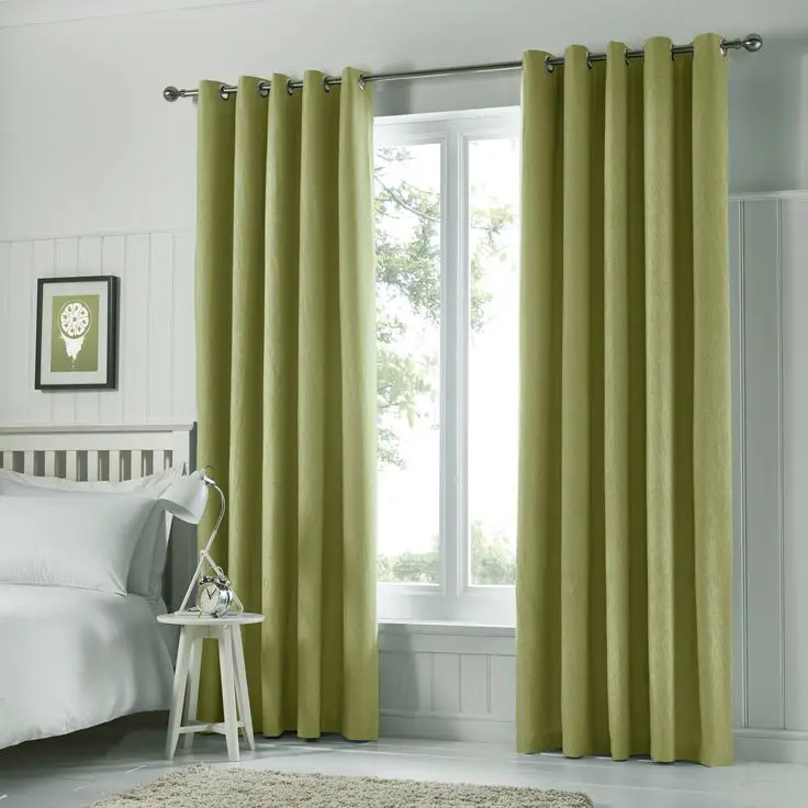Tyla Green Blackout Eyelet Curtains